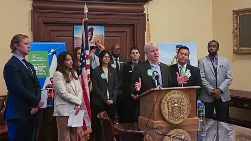 Tom Gilbert and other New Jersey environmental advocates at a press release about codifying an executive order to reach 100% clean energy by 2035.